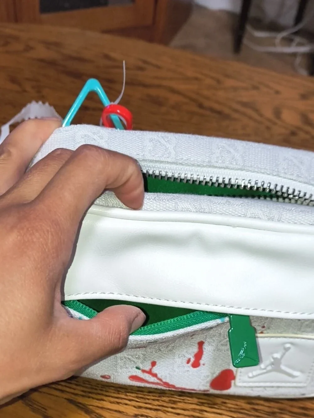 Jordan White Crossbody Bag with Red and Green Paint-Splash Accents